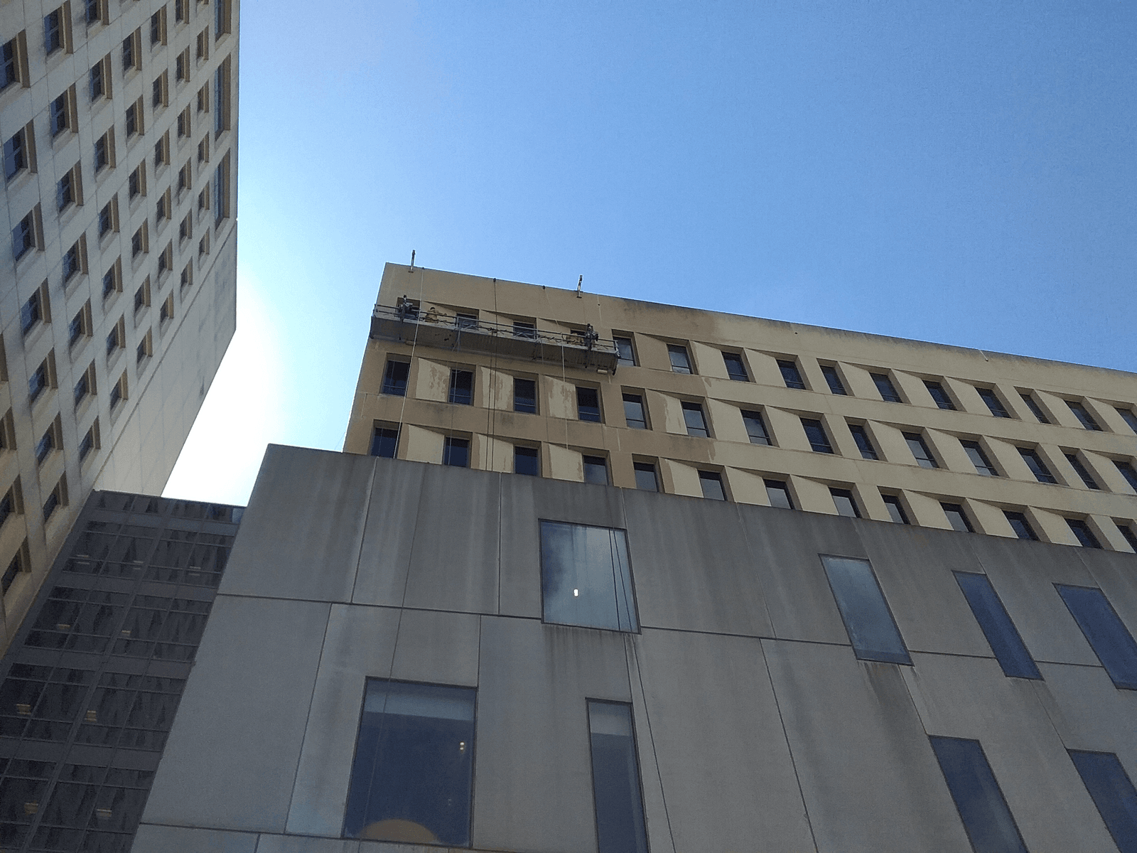 Commercial high-rise facade restoration with rooftop access
